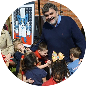 Photo of George Rodrigue with children